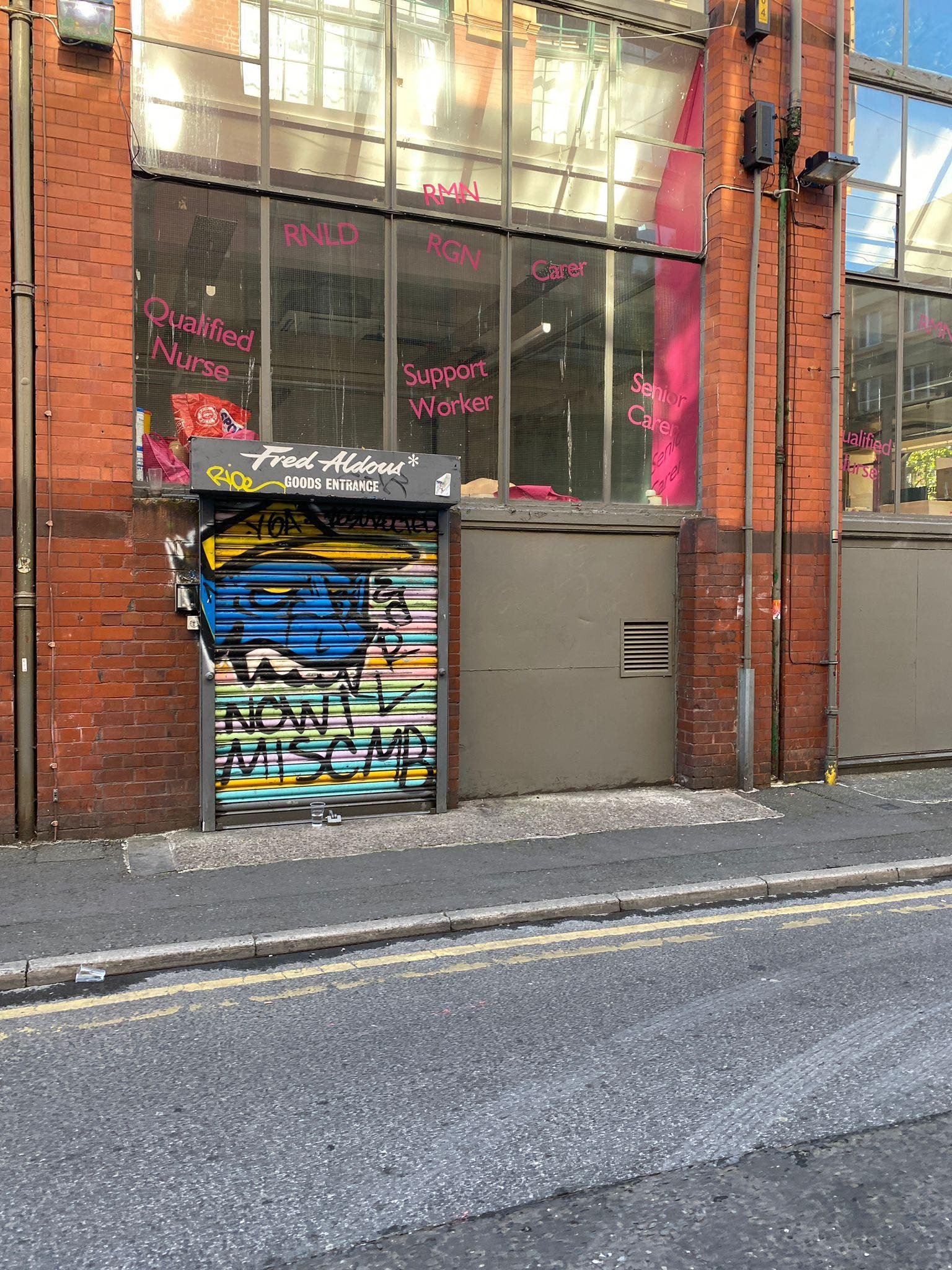 Pressure washing graffiti from render